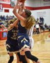 Ell-Saline sneaks past Sacred Heart girls 40-38 in season opener.