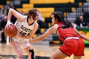 Lady Cougars start off explosive, but end up falling to the Liberal Redmen 46-22