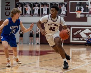 Andover Tops Mustangs 58-45 (Photo Gallery)