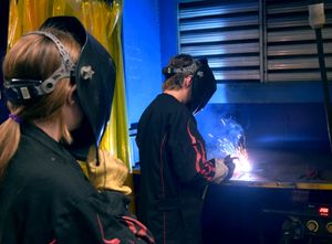 Staff from The Garage visit Salina Tech to learn about welding