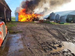Fire Destroys Shed and Hay Bales, Causing Significant Loss