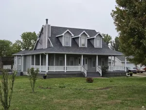 Home of the Day: Country Acre with 7-Car Shop & Wraparound Porch, 4377 N Sandy Ave